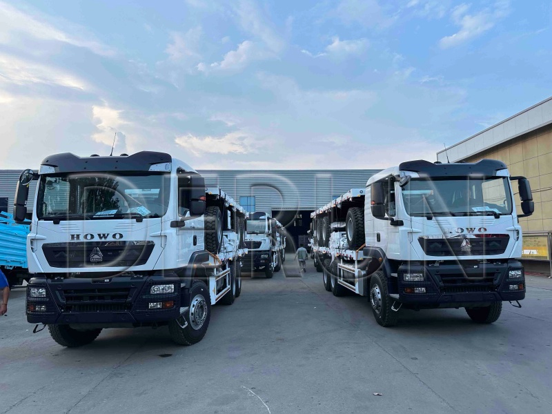 10 μονάδες Howo TX Fence Truck με ρυμουλκούμενο τραύλισμα φορτίου με επιτυχία αποστέλλεται στην Αιθιοπία